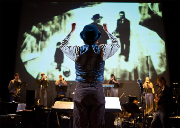 Darcy James Argue conducting Brooklyn Babylon at BAM - Photo credits James Matthew Daniel