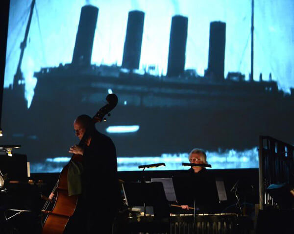 Gaving Bryars and his ensemble performing "The Sinking of the Titanic" at Barbican Centre - Photo http://www.gavinbryars.com