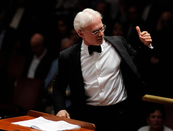 John Adams conducting - Photo by Lambert Orkis