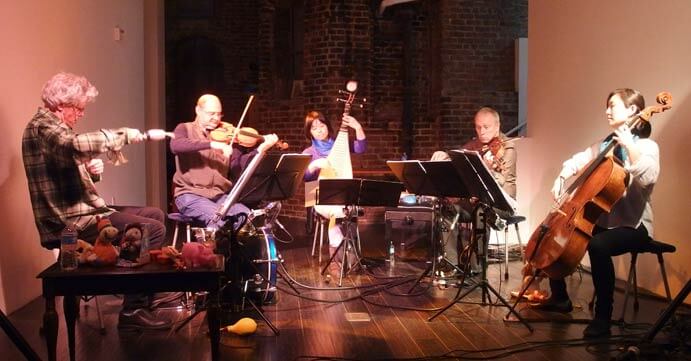 Kronos Quartet with Wu Man (photo: Larry Dunn)