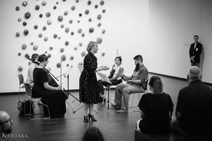 Amanda DeBoer introduces a string quartet performing new music by Stacey Barelos at Joslyn Art Museum during Omaha Under the Radar 2016