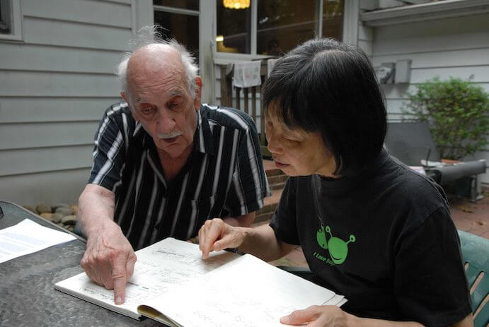 George Crumb shares initial sketches for Metamorphoses with Margaret Leng Tan --Photo by Ken Weiss