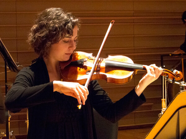 Andie Springer, violin, performing Villarreal's The Warmth of Other Suns Andie Springer, violin, performing Villarreal's The Warmth of Other Suns