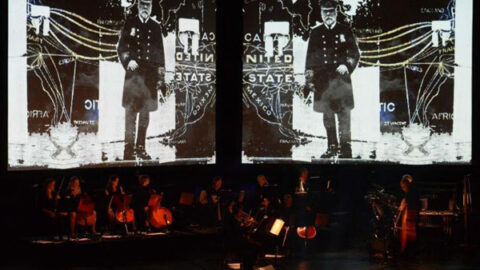 Gaving Bryars and his ensemble performing 