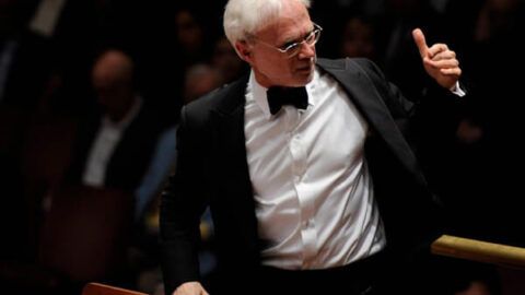 John Adams conducting - Photo by Lambert Orkis