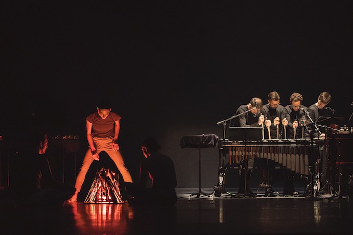 Hubbard Street Dancers Kevin Shannon (left seated), Adrienne Lipson (center), and Hubbard Street Apprentice Gaby Diaz (right seated) in There Was Nothing by Movement Art Is (Jon Boogz and Lil Buck) accompanied by Third Coast Percussion--Photo by Todd Rosenberg