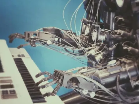 Robot Pianist -- Image by Possessed Photography